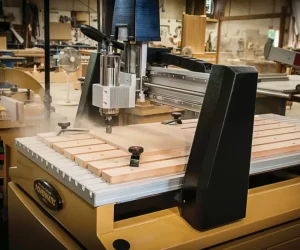 Advancement and Future of CNC Machine Design: Principles, Techniques, Applications, and Implications